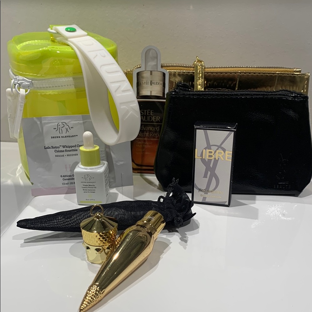 YSL, Drunk E Samples + Cosmetic Bags. Louboutin vintage lipstick.